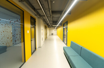 Empty hall or corridor with yellow walls