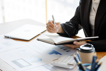 Audit concept,Administrator business man financial inspector and secretary making report calculating balance. Internal Revenue Service checking document.