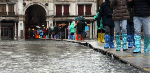 Elevated walkways for walking during high tide in San Marco square in Venice