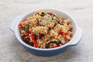 Arabic cous cous with meat and tomato