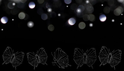 beautiful pattern of butterflies made of sequins on a black background