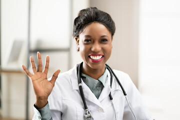 Doctor Waving In Online Video Call