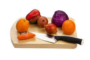 Chopping board with a knife and vegetables isolated on white background 