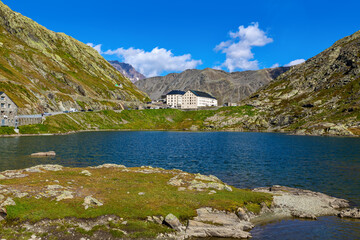 Small alpine lake in the mountains on the border between Italy and Switzerland.