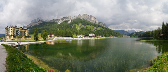 Fototapeta premium Misurina, Auronzo, Italy. Amazing view of the Misurina lake. Dolomiti, Alps, South Tyrol, Italy, Europe. Colorful summer landscape of the Misurina lake. Touristic destination. Famous landmark