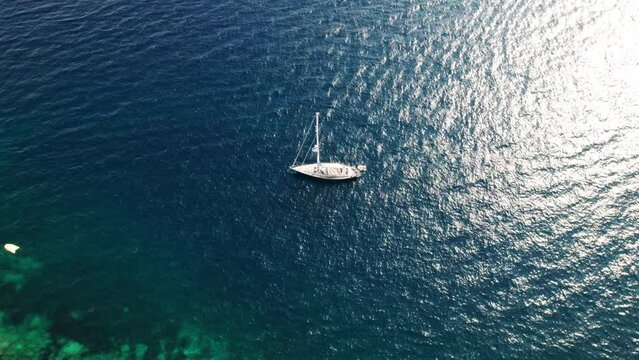 Drone Over Yacht Moored Off Coastline Of Cap De Creus