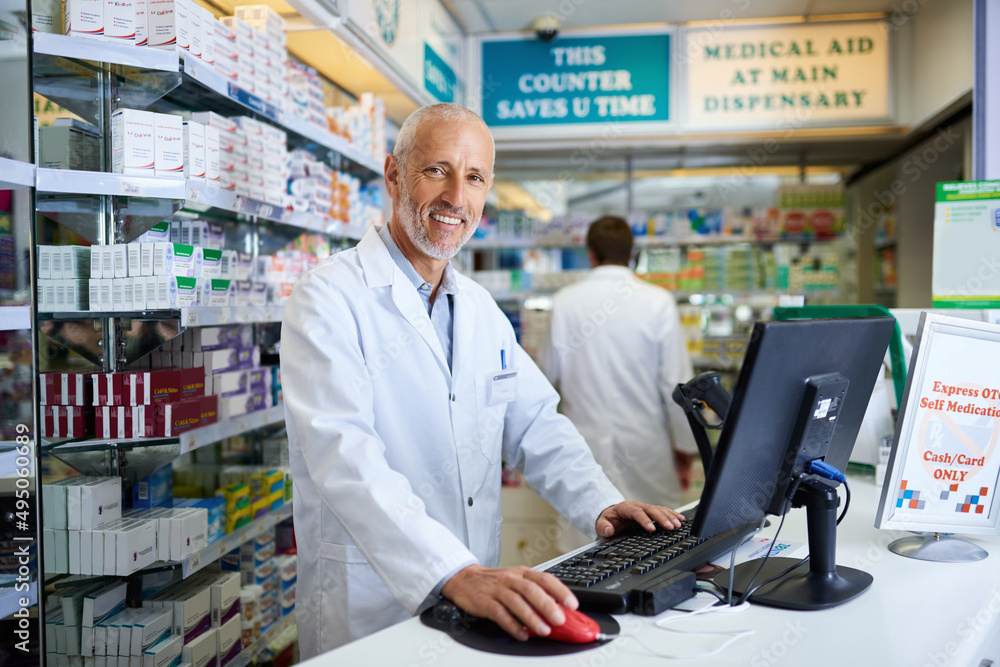 Poster our system allows us to swiftly locate the medication you need. portrait of a mature pharmacist work