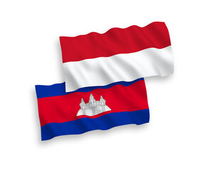 Fototapeta premium National vector fabric wave flags of Indonesia and Kingdom of Cambodia isolated on white background. 1 to 2 proportion.