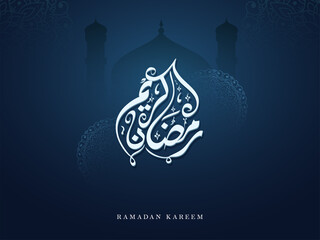 Arabic Calligraphy Of Ramadan Kareem With Silhouette Mosque On Blue Mandala Background.
