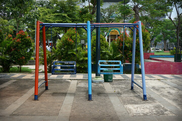 a swing is in the town square