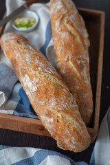 Home made fresh french Baguette loafs on a table