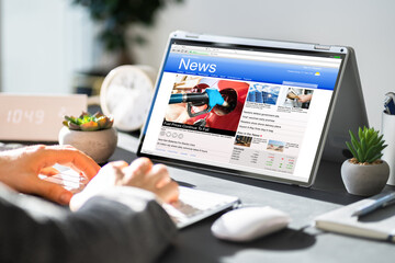 Watching News On Screen. Reading Newspaper Website