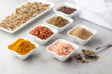 Various spices on a kitchen table.