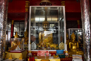 Ancient buddha statue in antique old ubosot for thai travelers travel visit respect praying blessing holy worship at  Wat Daeng Pracharat temple at Bang Kruai on March 15, 2022 in Nonthaburi, Thailand