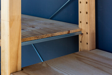 Wooden simple shelves for storing things in the apartment