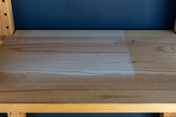 Wooden simple shelves for storing things in the apartment