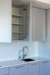 Wardrobe with open door and empty shelves