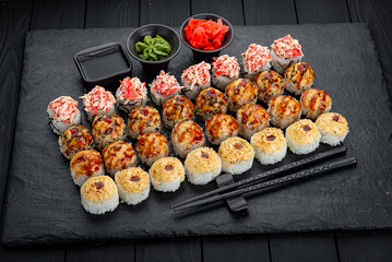 Set of sushi rolls with fresh fish.
