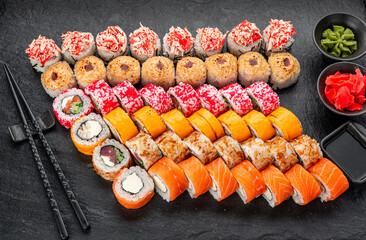Set of sushi rolls with fresh fish.