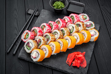 Set of sushi rolls with fresh fish.