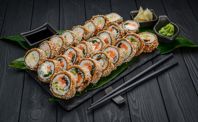 Set of hot sushi rolls in tempura.