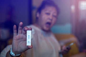 Selective focus to Rapid Antigen Test kit (ATK) with Positive result during swab COVID-19 testing....