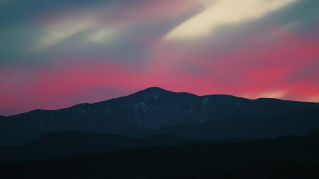 Snowy Peak mountain with pink sky 