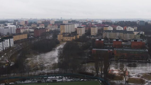 Drone shot flying over Solna Municipality in Sweden. Rainy and cloudy day