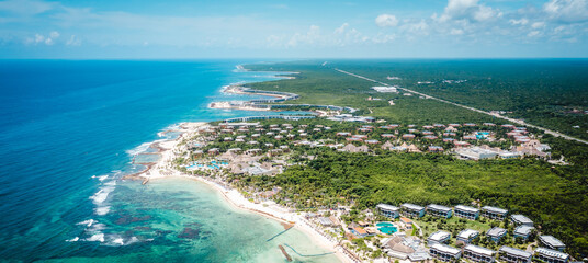 Aerial view of the Coba beach in Quintana Roo, Mexico. Caribbean Sea, coral reef, top view. Beautiful tropical paradise beach - obrazy, fototapety, plakaty