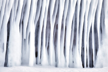 Frozen splash water on Baikal lake. Abstract winter background. Amazing scenery with frozen water