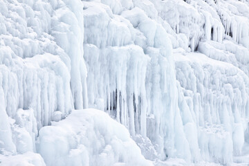 Frozen splash water on Baikal lake. Abstract winter background. Amazing scenery with frozen water