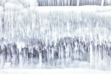 Frozen splash water on Baikal lake. Abstract winter background. Amazing scenery with frozen water