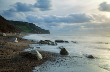 February morning high tide at Branscombe beach Seaton east Devon in the west of England UK