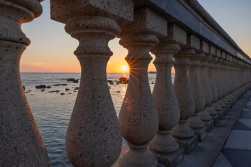Beautiful sunset view from Mascagni terrace in a sunny day. Livorno, Tuscany, Italy