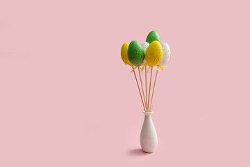 Festive decoration for Easter. Easter eggs in a white vase on a pink background.