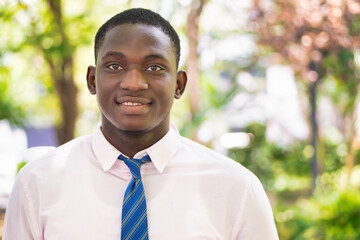 Happy smiling black African businessman