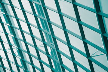 Detail of structure metal glass curving roof of modern building. Abstract pattern from detail of modern contemporary architecture concept.