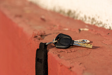 a black key on a wall