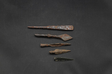 antique spear head on black background