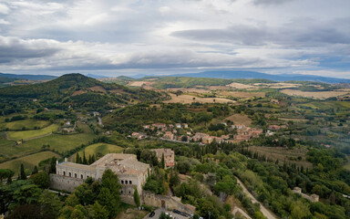 Fototapeta na wymiar Views from a small historical town Civita di Bagnoregio from above. Aerial drone photo, Montepulciano, Italy