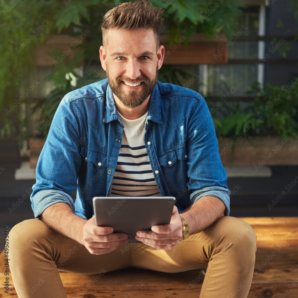 Aufkleber i cant survive without social media at my side. portrait of a handsome young man using a digital tab