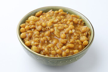 Indian Food-Ragda Pattice is popular street food of India. Ragada is a curry made of yellow vatana & pattice is made of potatoes along with spices. garnished with Sweet & mint chutney, chopped onions.