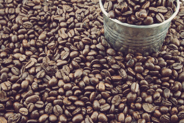 Dark coffee bean roasting. Coffee drink and cafe concept.	