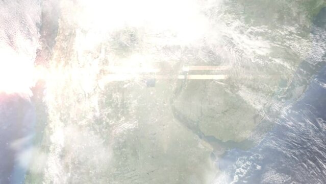 Earth zoom in from outer space to city. Zooming on Rafaela, Santa Fe, Argentina. The animation continues by zoom out through clouds and atmosphere into space. Images from NASA