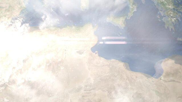 Earth zoom in from outer space to city. Zooming on Gabes, Tunisia. The animation continues by zoom out through clouds and atmosphere into space. Images from NASA