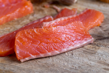 red salted salmon fish meat on a chopping board