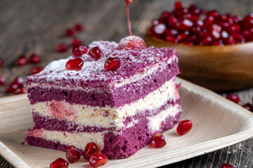 Obraz na płótnie Canvas a maroon-colored cake with the taste of different berries