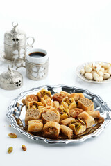 Mix Baklava Dish or Baklawa is Arabic and Turkish Traditional Sweets with Pistachio.