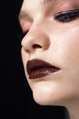 Naklejka premium Portrait of a girl with a beautiful and unusual appearance with makeup