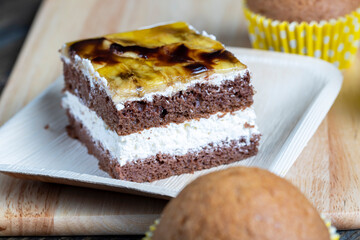 a piece of banana cake and fresh sliced bananas
